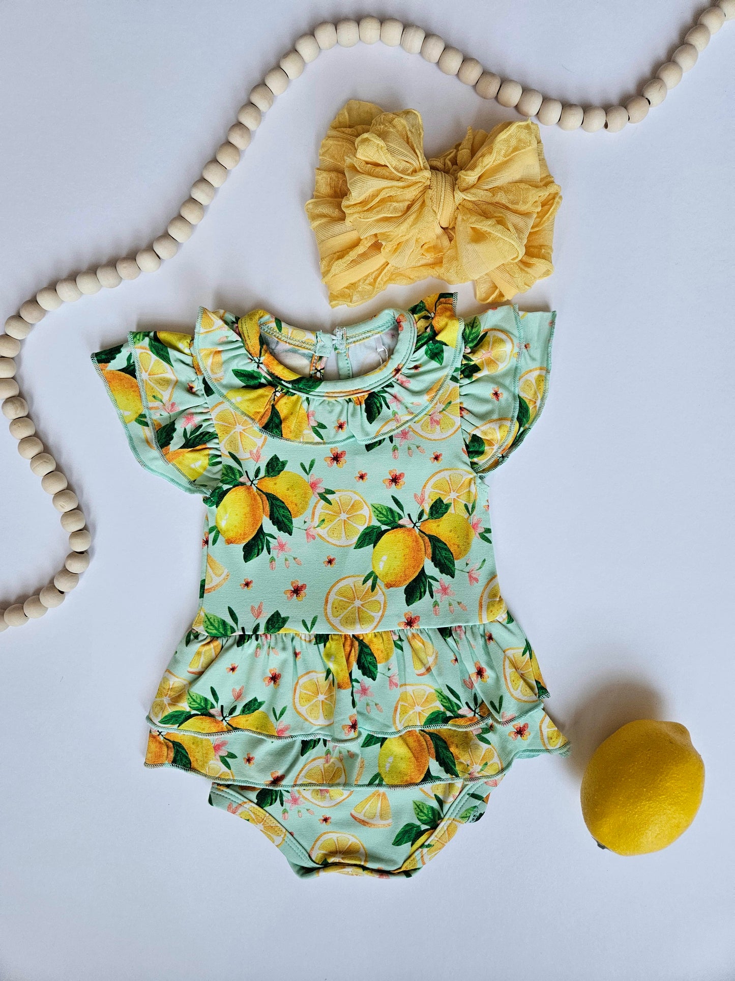 Rockin Royalty Baby Lemon Twist Flutter Onesie