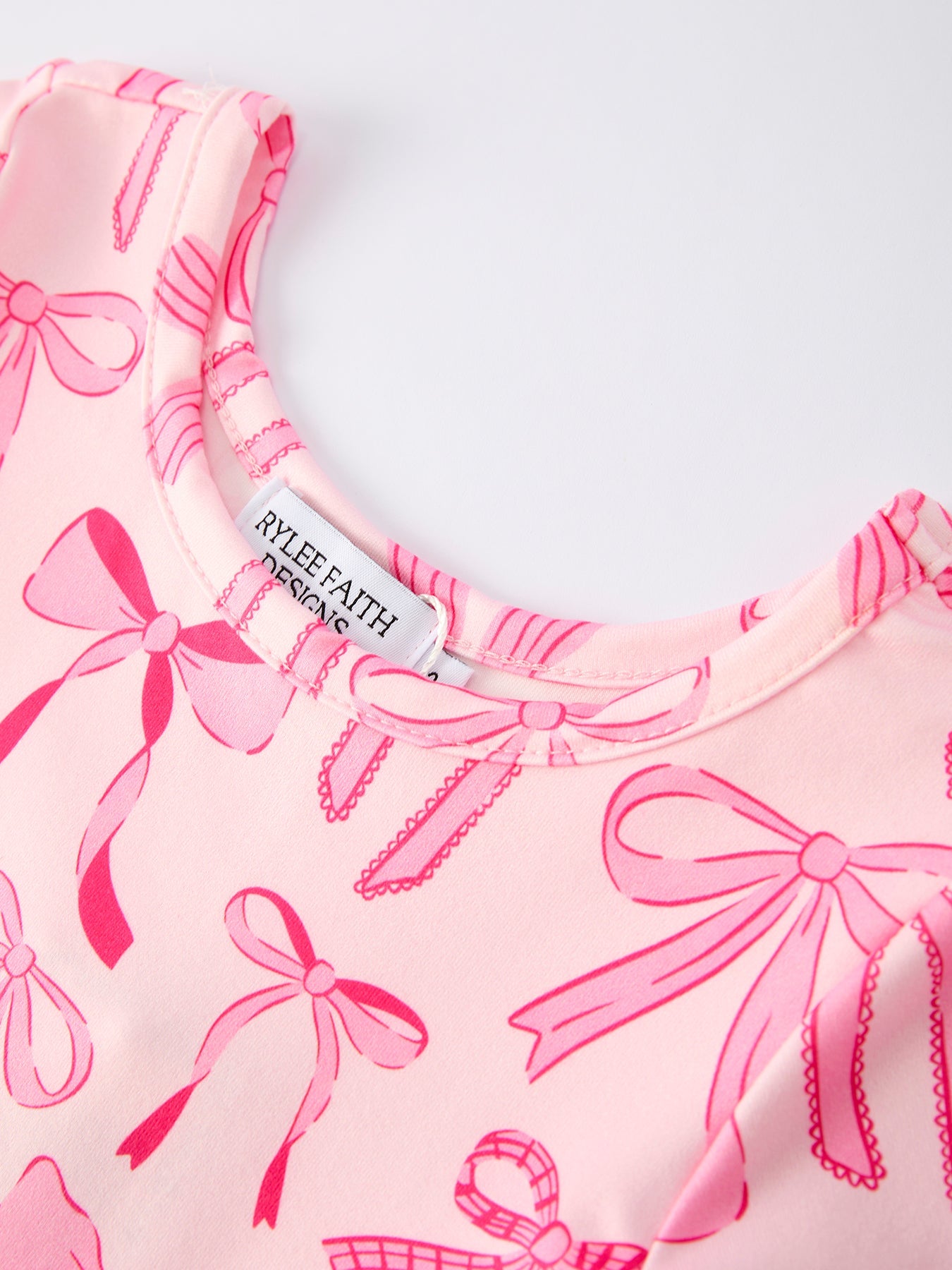 Rylee Faith Designs Girls Pink Dress with Bow Pattern - Cute Short Sleeve Outfit