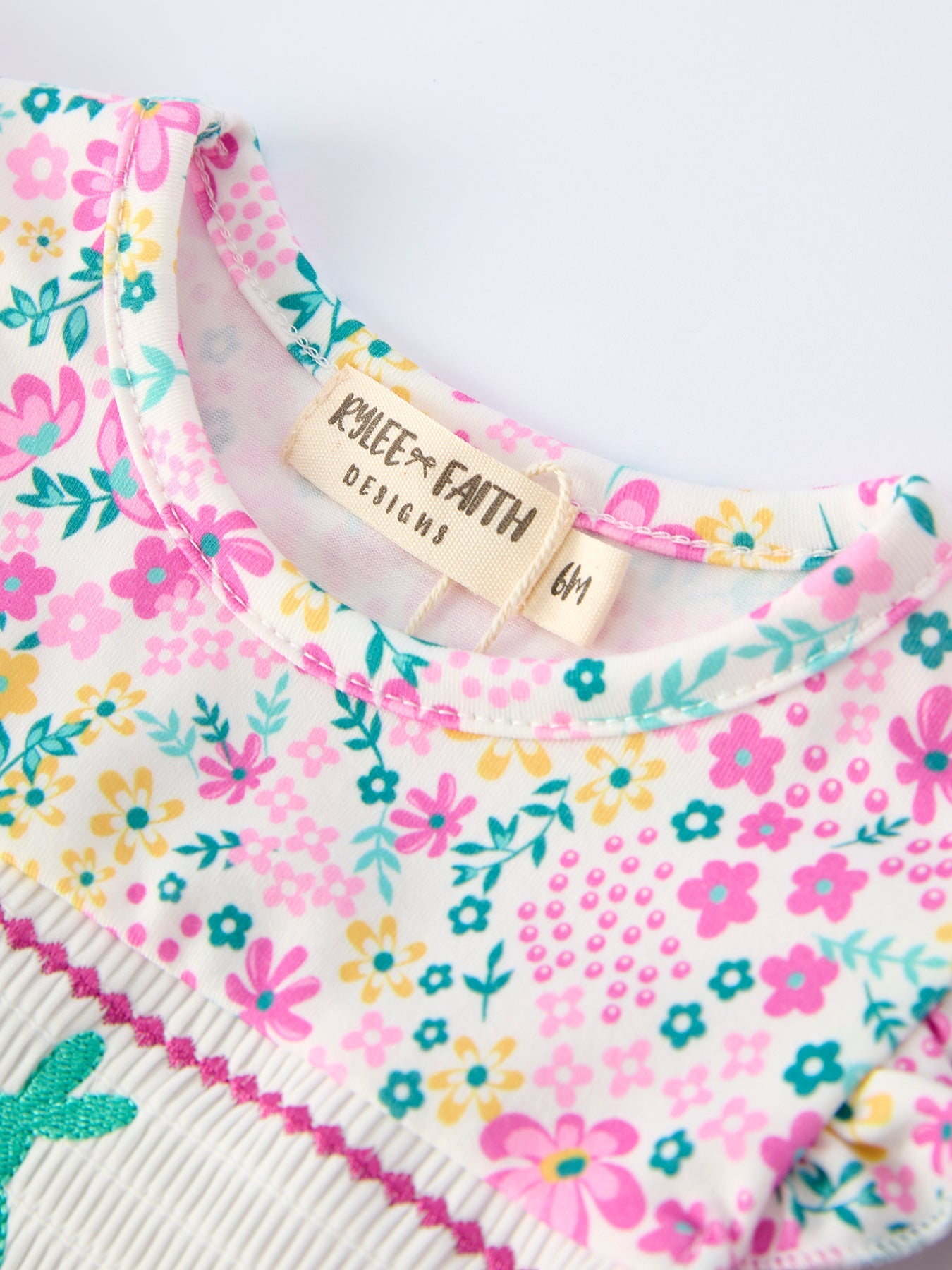 Rylee Faith Designs Easter Colorful Floral Bunny Bow Smocking Embroidery Baby Girl Romper