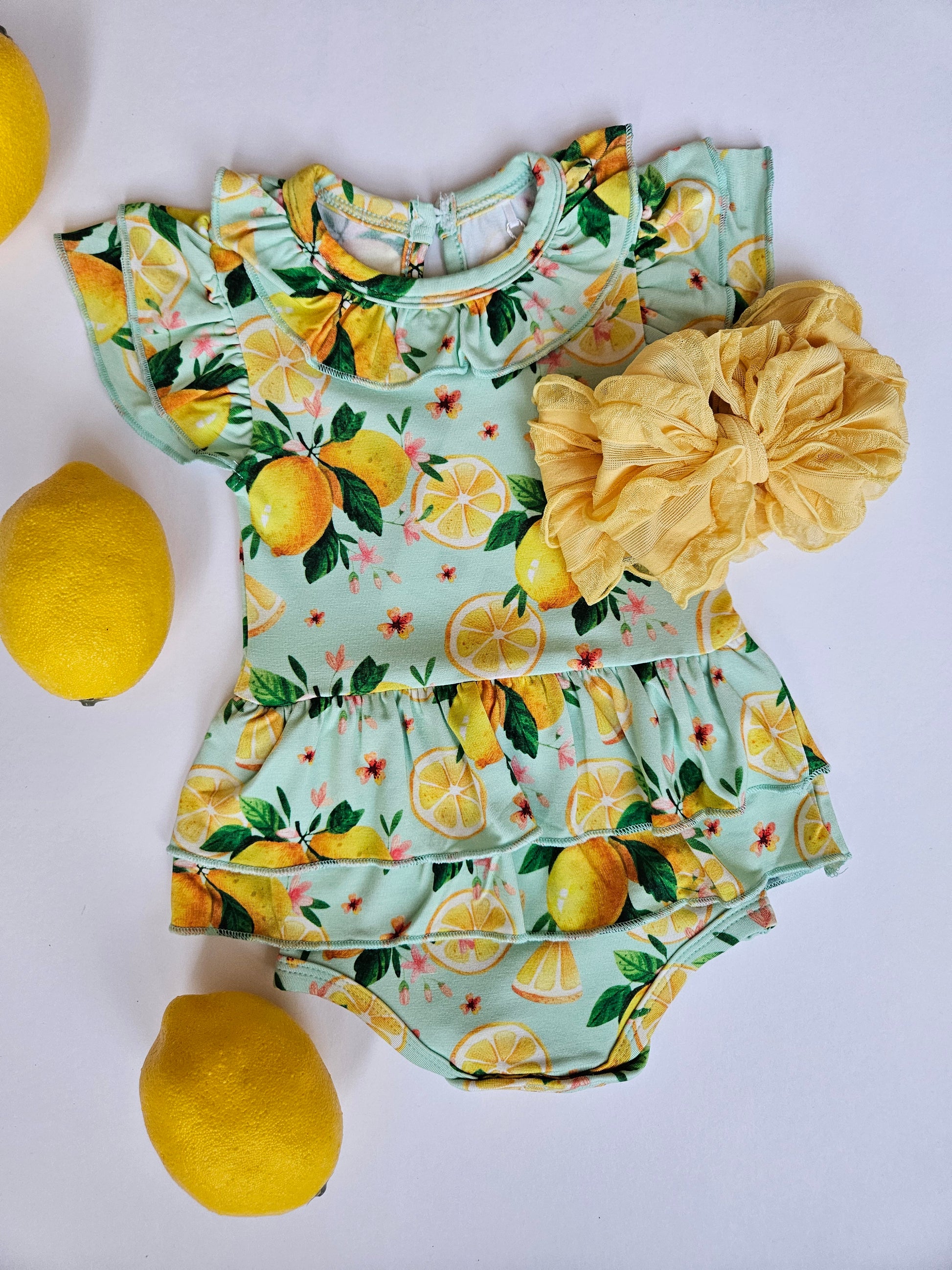 Rockin Royalty Baby Lemon Twist Flutter Onesie