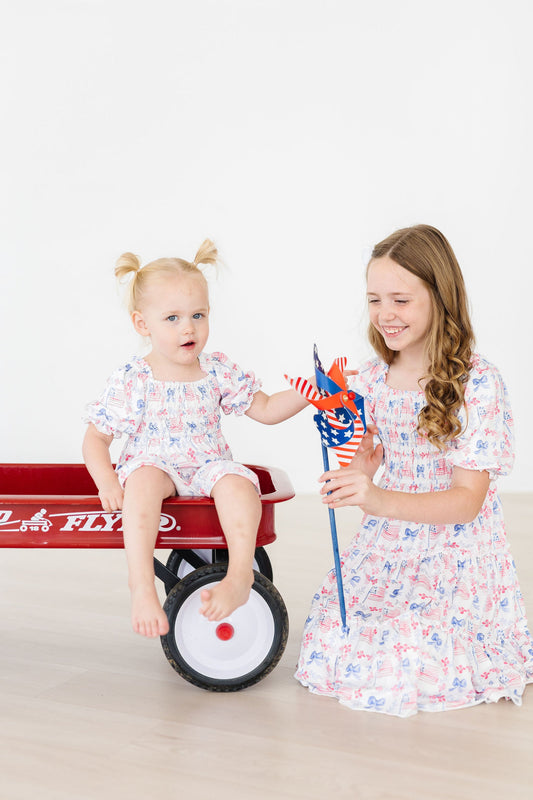 Mila & Rose Vintage Flags Smocked Ruffle Dress