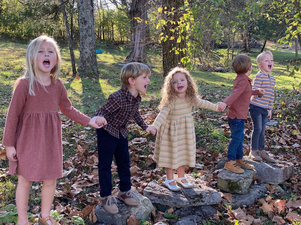 Vignette from Magpie & Mabel Gold Winnie Dress