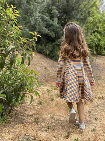 Vignette from Magpie & Mabel Gold Multi Stripe Abbey Dress